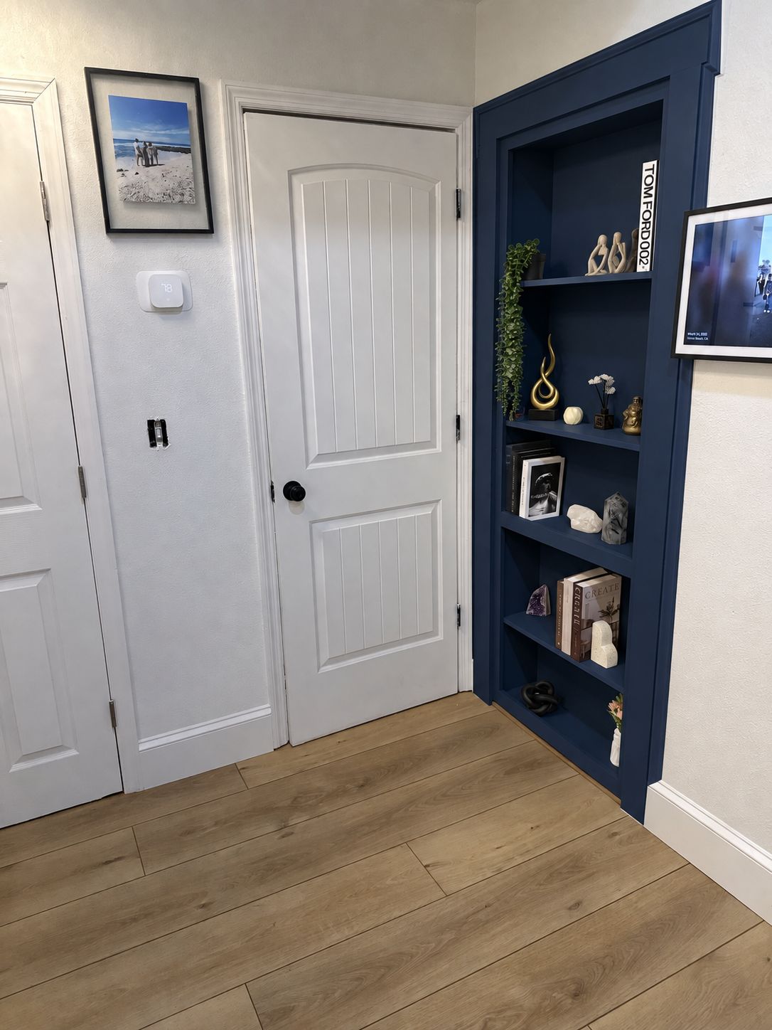Hidden bookcase door: Navy finish, an AI-edited design concept based on this project
