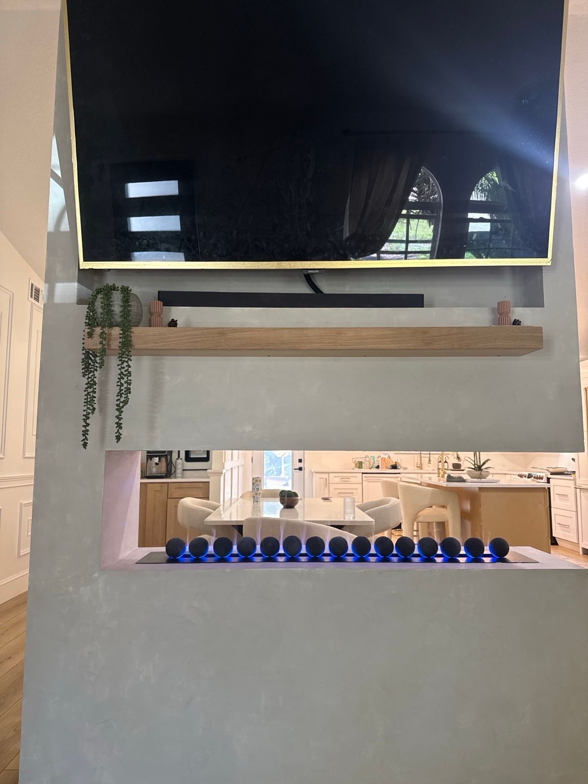 See-through vapor fireplace in the actual renovated home